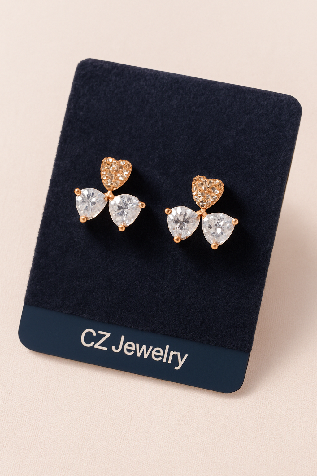 Elegant heart‑cut bow studs that symbolize love and grace
