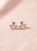 Elegant heart‑cut bow studs that symbolize love and grace